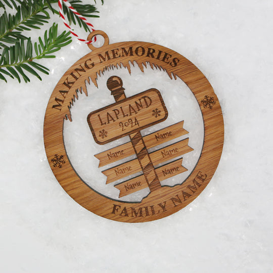 Merry Christmas Lapland Signpost Circle Memento (up to 6 names)