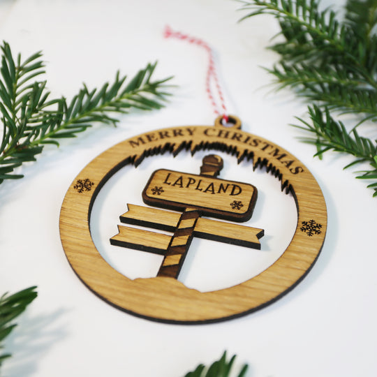 Merry Christmas Lapland Signpost Circle Memento (up to 6 names)