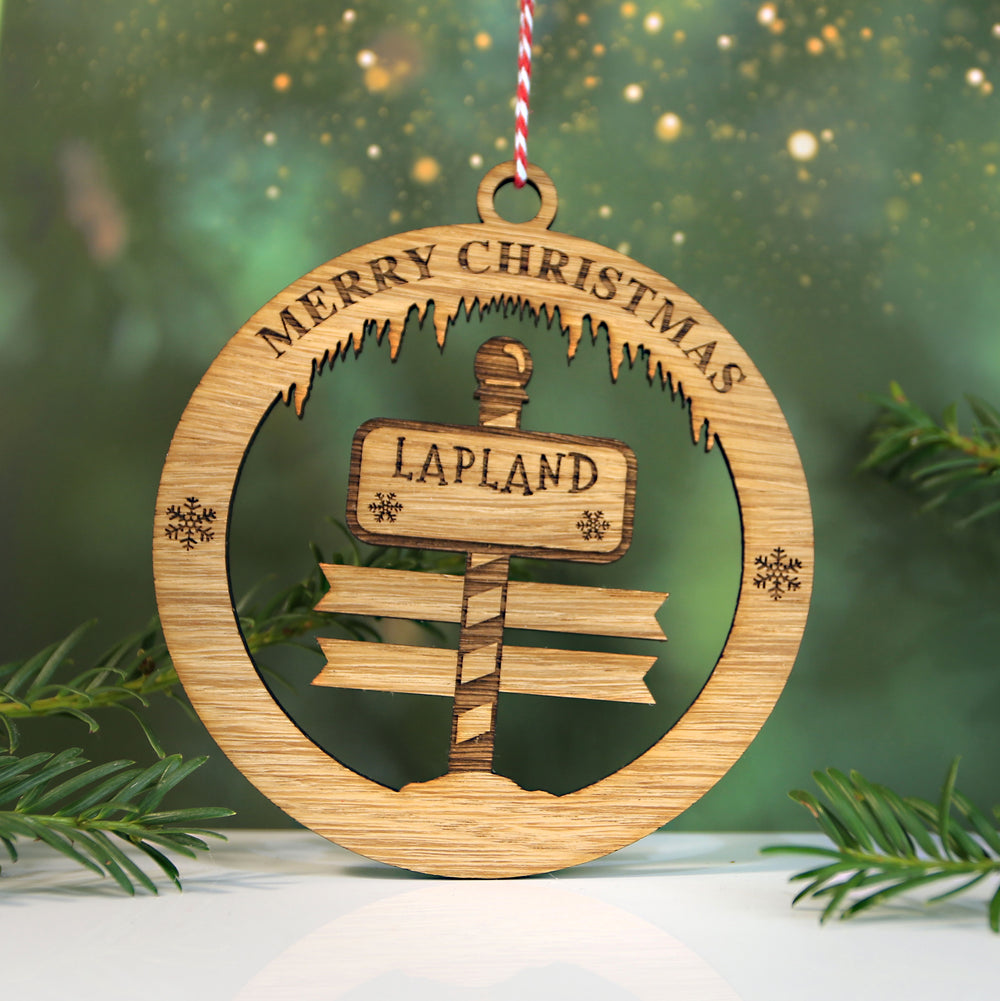 Merry Christmas Lapland Signpost Circle Memento (up to 6 names)