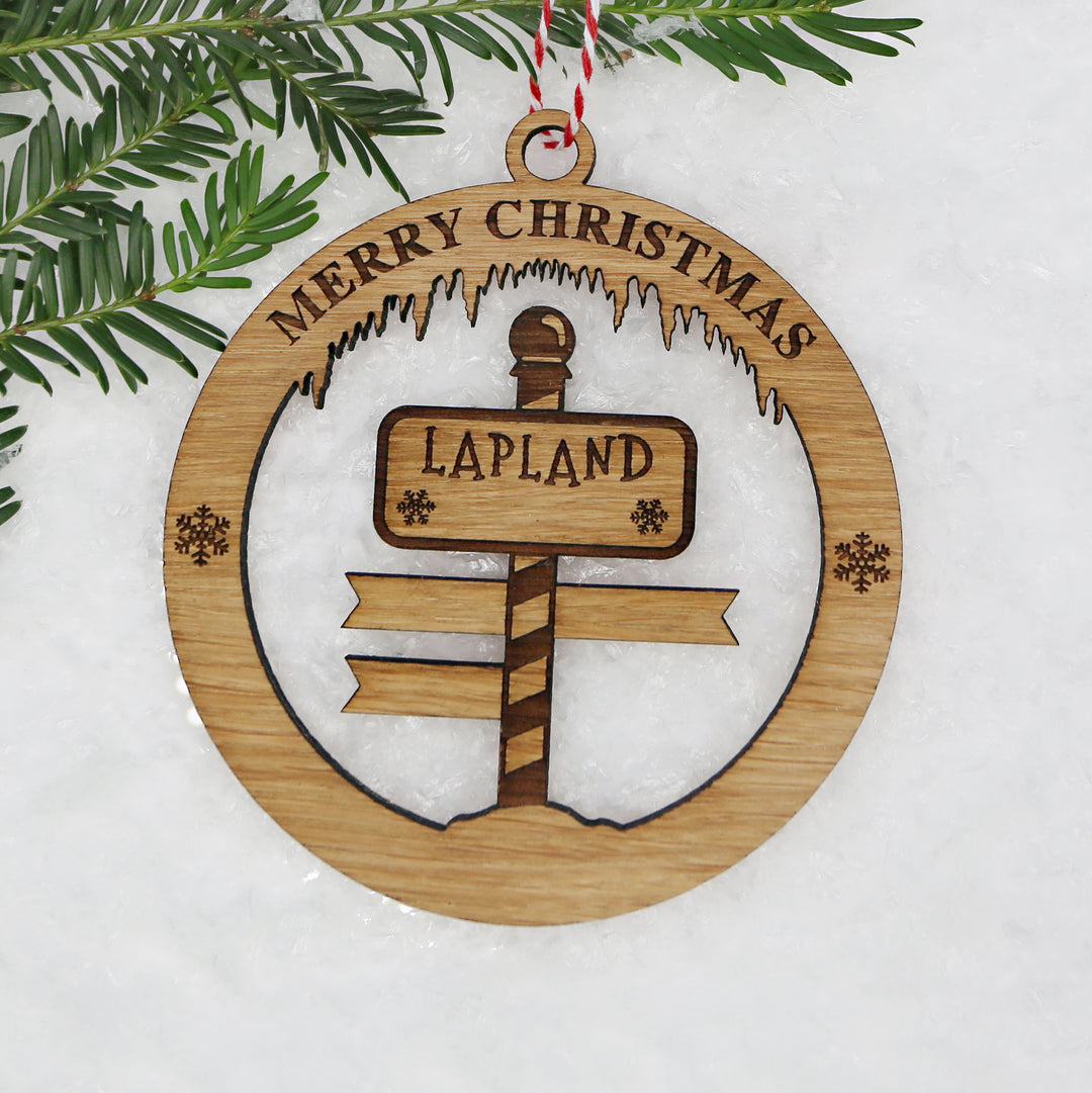 Merry Christmas Lapland Signpost Circle Memento (up to 6 names)