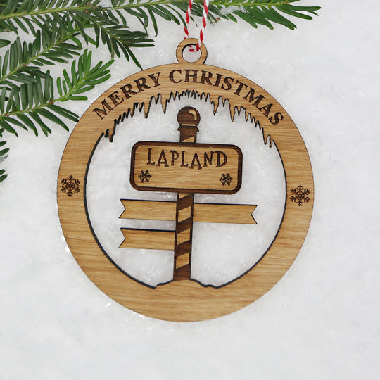 Merry Christmas Lapland Signpost Circle Memento (up to 6 names)